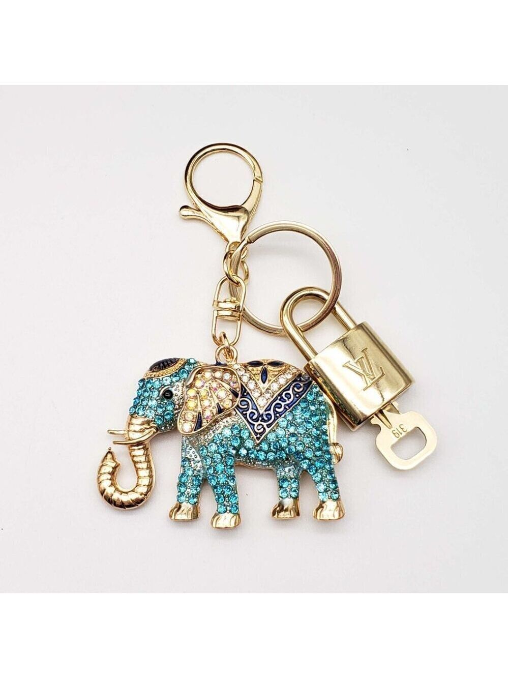100% Auth Louis Vuitton Lock & Key with unbranded Bagcharm, Keycharm, Keychain